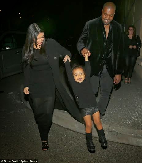 MXM UPDATE: North West shows off her playful side as her parents swing her in the air