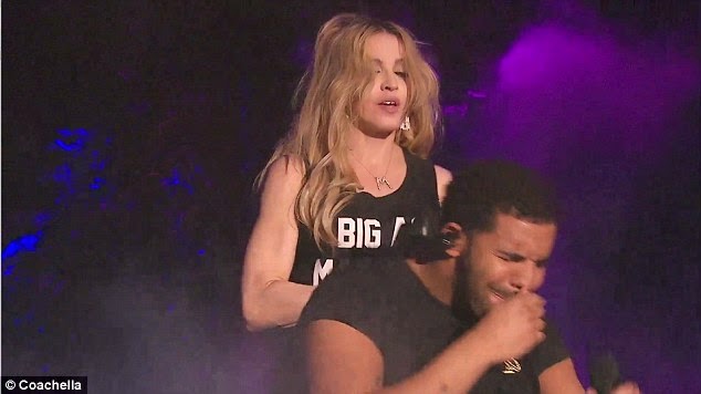 MXM UPDATE: Drake looks horrified & wipes his mouth after getting a kiss from Madonna